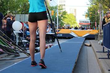 Athletes compete in a pole vaulting competition on Ouellette Ave., May 22, 2015. (Photo by Jason Viau)