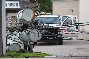 A pole fire causes a transformer to fall on Tecumseh Rd. at Southfield Dr. in Tecumseh, June 18, 2015. (Photo by Jason Viau)