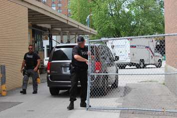 Windsor Police Explosive Disposal Unit arrives on scene, as a suspicious package is investigated downtown, June 17, 2015. (Photo by Mike Vlasveld)
