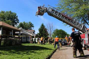 Fire crews respond to a fire at 3584 King St., June 3, 2015. (Photo by Jason Viau)