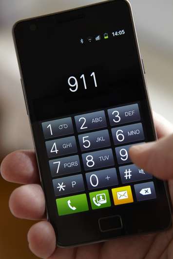 911 on a cell phone  © Can Stock Photo / daisydaisy