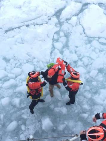 The coast guard rescues a man attempting to walk across Lake St. Clair on March 5, 2015. (Photo courtesy U.S. Coast Guard/Lt. Josh Zike)