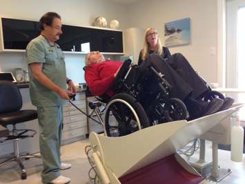 Dr. Larry Soden unveils new equipment to improve accessibility at his Colborne Rd. office. January 28, 2015 (BlackburnNews.com photo by Melanie Irwin)