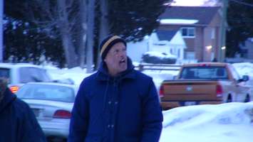 Floyd Porter chants during a protest on Taylor Ave (Photo by Jake Kislinsky).