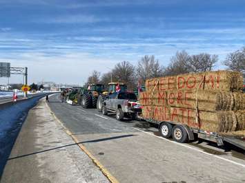 Farm vehicle convoy on westbound 402. Blackburn Media photo by Melanie Irwin.