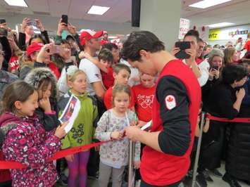 Scott Moir signs autographs at the London International Airport. February 26, 2018. Photo by Scott Kitching. 