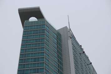 People rappel down the side of Caesars Windsor to raise money for local Easter Seals families through the charity's Drop Zone event, October 6, 2015. (Photo by Mike Vlasveld)