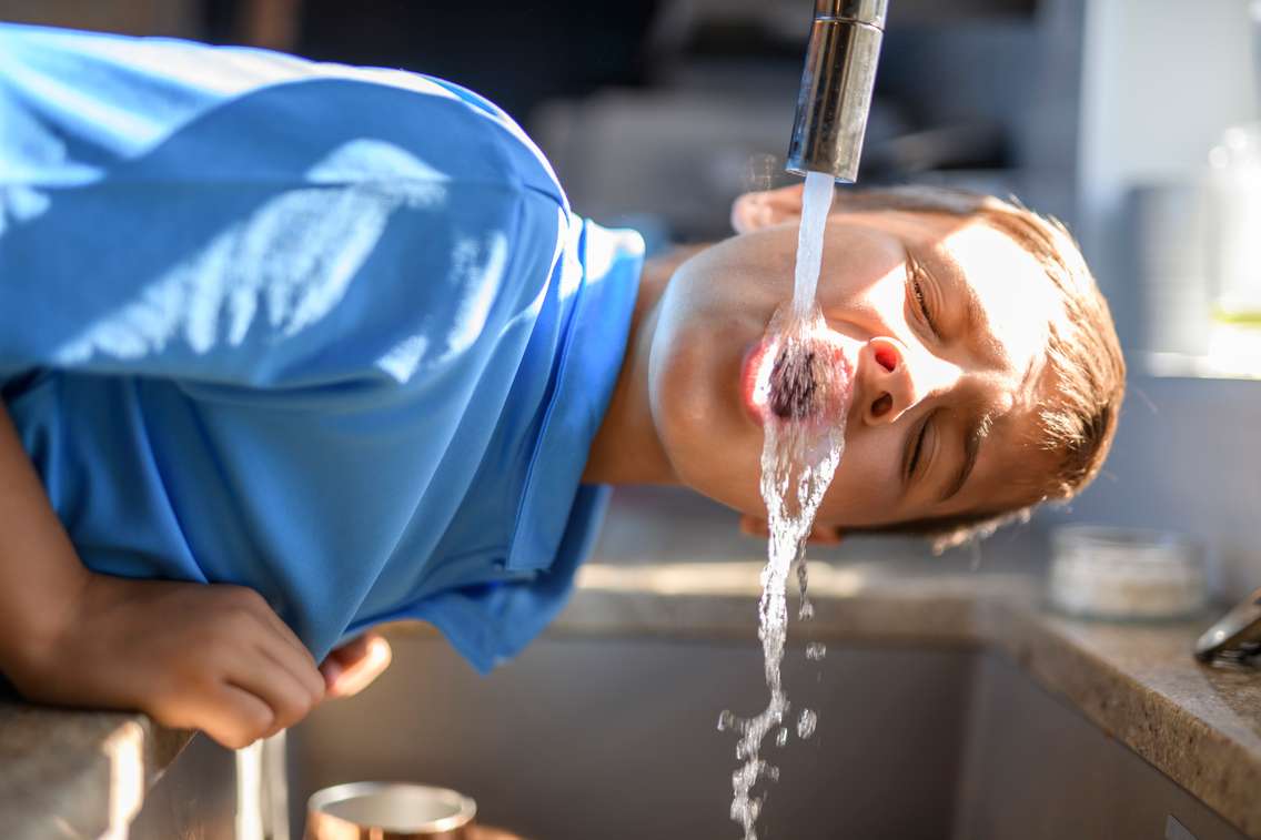 Child drinking water.  Credit Getty Images.  LSOphoto