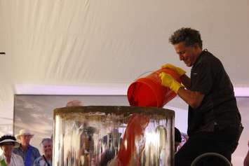 Celebrity chef Bob Blumer pours tomato juice into the World Records attempt at the largest Bloody Mary cocktail, September 19, 2018.  (Photo by Angelica Haggert)