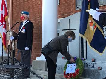 Memorial Cross Mother Pat Poland lays wreath at Sarnia Legion Nov 11, 2020. (BlackburnNews.com photo by Sue Storr)