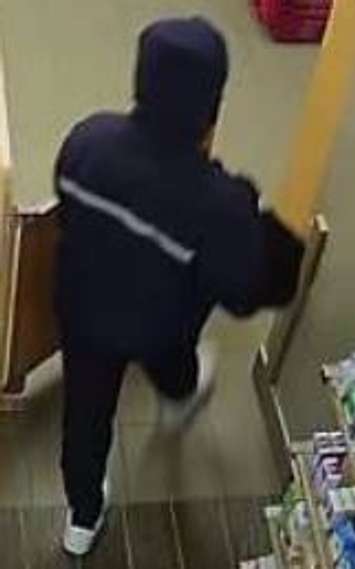 A screengrab taken from a security camera shows a suspect connected to a pharmacy robbery in Windsor, February 13, 2020. Photo provided by Windsor Police Service.