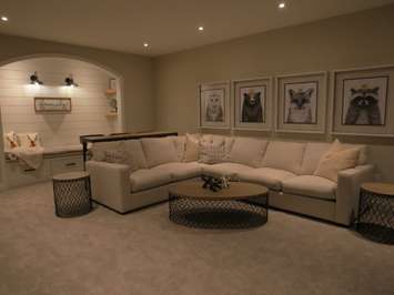 The basement TV room  inside the Dream Lottery home at 2397 Meadowlands Way. (Photo by Miranda Chant, Blackburn News)