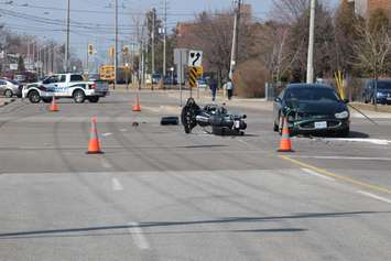 One person has been sent to hospital following a crash at the intersection of Lauzon Rd. and McHugh St., April 1, 2015. (Photo by Jason Viau)