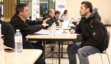  Students discuss career possibilities at a job fair. Blackburn Media file photo by Mike Vlasveld.
