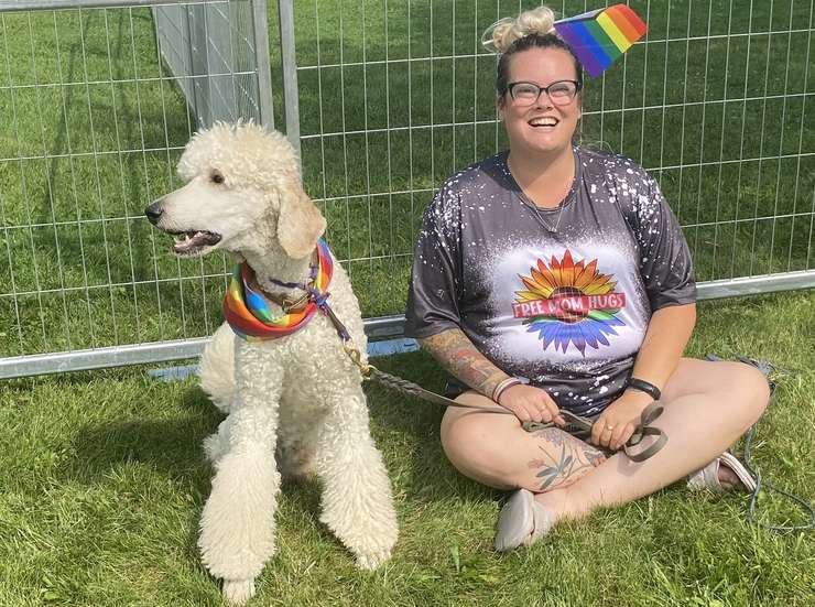 Pup takes in Pride parade, August 13, 2023 (Photo courtesy of Adelle Loiselle, Blackburn Media)