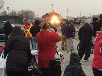 Hundreds gather in Windsor to watch as the CP Holiday Train pulls in. (Photo by Jason Viau)