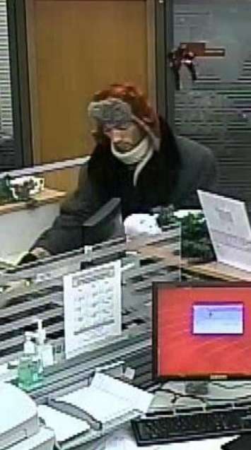 Police are looking for this suspect following a robbery at a CIBC in Tillsonburg. (Photo courtesy of the Ontario Provincial Police)