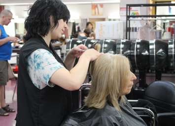 A hospice patient is treated to a day at the salon with St. Clair College students, July 19, 2016. (Photo by Maureen Revait) 