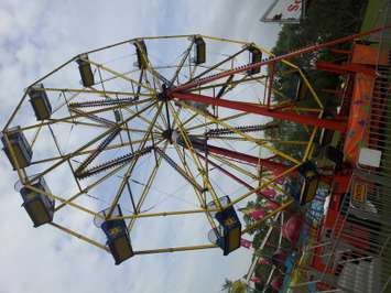 People of all ages enjoy the rides and entertainment at the Tilbury Kinsmen Summer Festival, June 14, 2015. (Photo by the Blackburn Radio Summer Patrol)