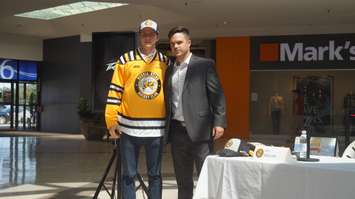 Louis Latta with Sarnia Sting GM Nick Sinclair. (photo by Jake Jeffrey blackburnnews.com)