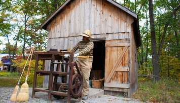 Lambton Heritage Museum staff performing a broom demonstration (Photo by: County of Lambton)