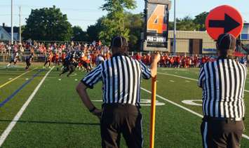 Sarnia's defense tries to hold the line on fourth and inches. August 6, 2016. Photo by Jake Jeffrey (www.blackburnnews.com)