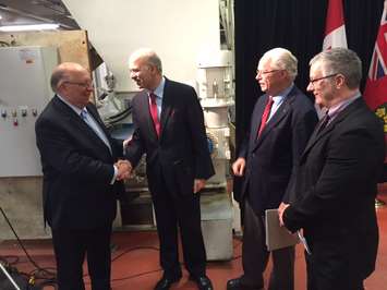 Sarnia Lambton MPP Bob Bailey thanks Ontario Minister of Research and Innovation, Reza Moridi after he announced $3-million investment for Biotechnology Hub in Sarnia. June 10, 2016 (Blackburnnews.com photo by Melanie Irwin)