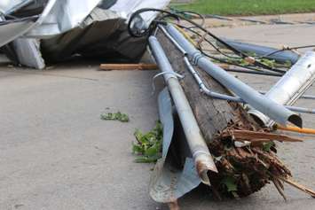 Crews assess and clean up the damage left near the EC Row Expressway and Central Avenue in Windsor on August 25, 2016 after a tornado hit the area. (Photo by Ricardo Veneza)