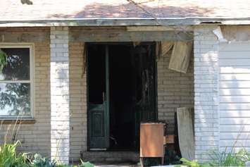Aftermath of a house fire at 6803 Talbot Trail, August 8, 2016 (Photo by Jake Kislinsky)