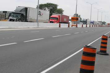 Two transport trucks collide in the eastbound lanes of Hwy. 401 just west of the Dougall overpass, June 18, 2015. (Photo by Jason Viau)