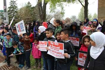 Protesters demonstrate against Ontario's new sex education curriculum outside Northwood Public School May 5, 2015.  (Photo by Adelle Loiselle)