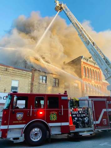 Fire crews tend to a fire on King St. in downtown Forest. June 16, 2021. (Photo by Petrolia & North Enniskillen Fire Department)