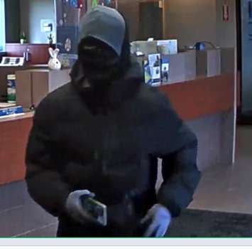 One of three suspects involved in an armed robbery at a bank on Arkona Road. April 5, 2023. Photo via OPP.