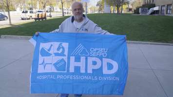 Bluewater Health Senior Laboratory Technologist and Local 145 Chair Philip Hodgetts during a rally against Bill 60. 27 April 2023. (Photo by Sarnia News Today)