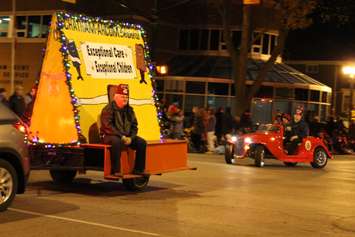 Local residents line the streets of Downtown Chatham during the Santa Clause Parade, November 20, 2015. (Photo by Ricardo Veneza)