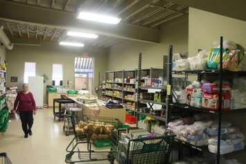 Shelves may look very stocked at the Outreach for Hunger, the supply is used as fast as it comes in. October 9, 2018. (Photo by Greg Higgins)