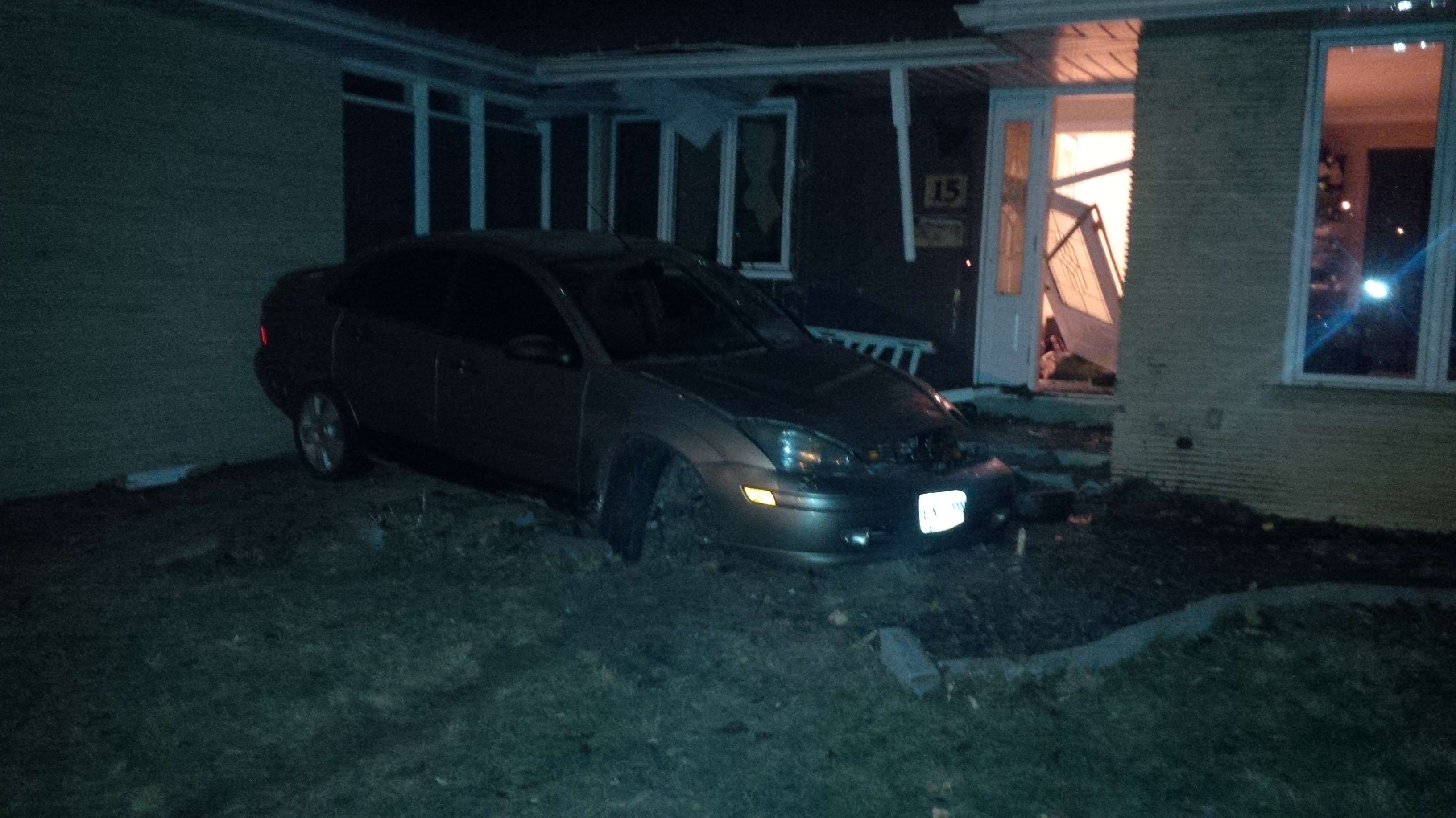 Homeowner Recounts Front Yard Crash (Gallery)