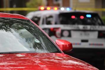 Windsor police investigate a shooting on Howard Ave. at Erie St., September 9, 2015. (Photo by Jason Viau)
