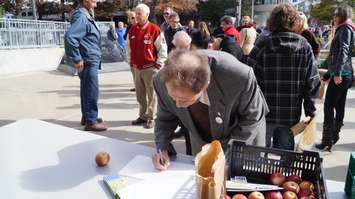 A petition is being circulated to support a National Anti-Poverty Program. October 16, 2015. (BlackburnNews.com Photo by Briana Carnegie)