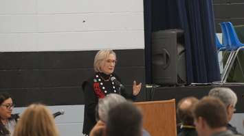 Minister of Indigenous and Northern Affairs Carolyn Bennett speaks at a historic signing ceremony  to resolve outstanding issues regarding the former Camp Ipperwash lands. April 14, 2016 (BlackburnNews.com Photo by Briana Carnegie)