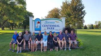 Photo: (left to right) Henry Kulik, Diana LeTourneau, Jeff Baarschers, Lynn
Baarschers, Matt Abbott, Patti Ross, Leona Holland, Anne Marie Gillis, Al
Duffy, Pat Voegelin and Dave Beatty sit in front of the new Centennial Park sign. (Photo submitted.)