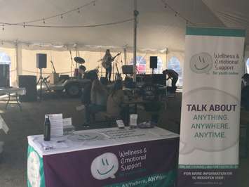 Some live music in the events tent at Huron County Hockey Day, with an information kiosk set up for WesForYouthOnline, who partnered with Tanner Steffler Foundation on the event in Clinton. September 14th, 2019 (Photo by Ryan Drury)
