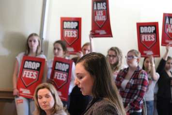 Student and CUPE Local 4580 President Mia Sisic, right, speaks against a tuition increase at the University of Windsor, April 28, 2015. (Photo by Jason Viau)