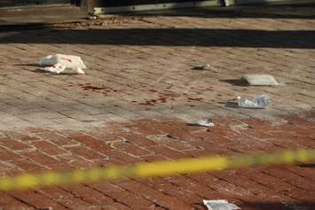 Windsor police investigate a stabbing at 810 Ouellette Ave., April 24, 2015. (Photo by Jason Viau)