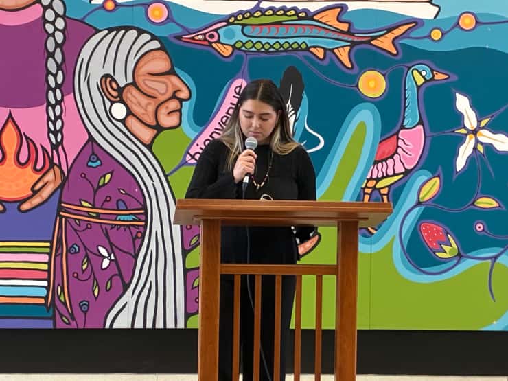 Artist Kennady Rayn speaking during the mural unveiling. March 18, 2026. (Photo by Evan Frederiksen)