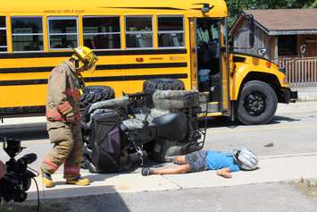 Emergency crews simulate an ATV crash at the Chatham-Kent Children's Safety Village, August 24, 2016 (Photo by Jake Kislinsky)