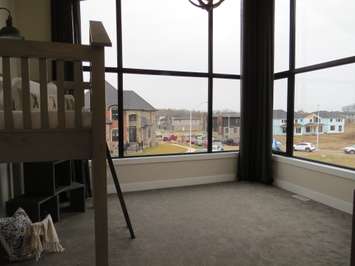 An upstairs bedroom inside the Dream Home at 2162 Ironwood Rd. (Photo by Miranda Chant, Blackburn News)
