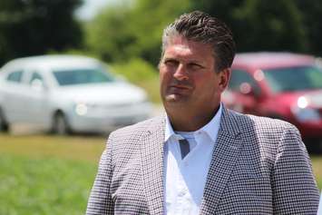 BlackburnNews.com file photo of Windsor Regional Hospital CEO David Musyj at the proposed mega hospital site on County Rd. 42, July 16, 2015. (Photo by Jason Viau)