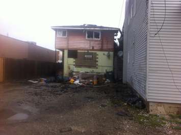 Fire damage to the rear of a building in the 700-block of Erie. St. (Photo by Adelle Loiselle)