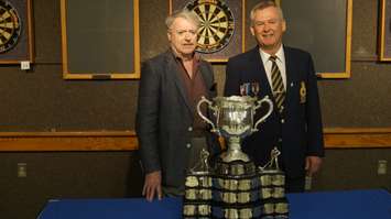 Memorial Cup on display at Sarnia Legion. (Left to right) Sarnia Mayor Mike Bradley and Branch 62 First Vice-President Jim Burgess. May 18, 2017 (Photo by Melanie Irwin)